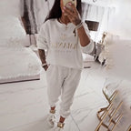 Zweiteiler mit Print-Bluse und weiter Hose – Damen